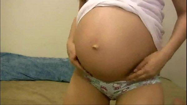 Pregnant Brunette Goes Solo