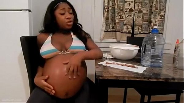 Cute black pregnant babe very hungry